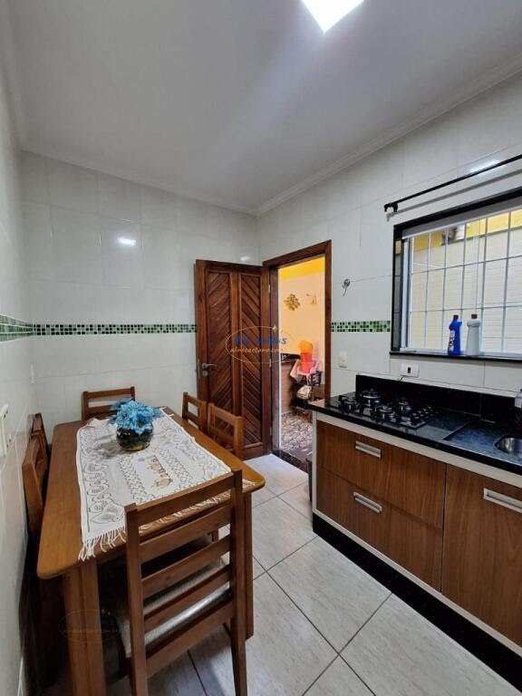 Casa à venda com 2 quartos, 1 suíte, 2 vagas e 70m² no Vila Assuncao, Praia Grande (SP) — foto 25 de 29