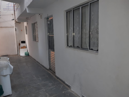 fachada de outra casa quarto/sla e cozinha