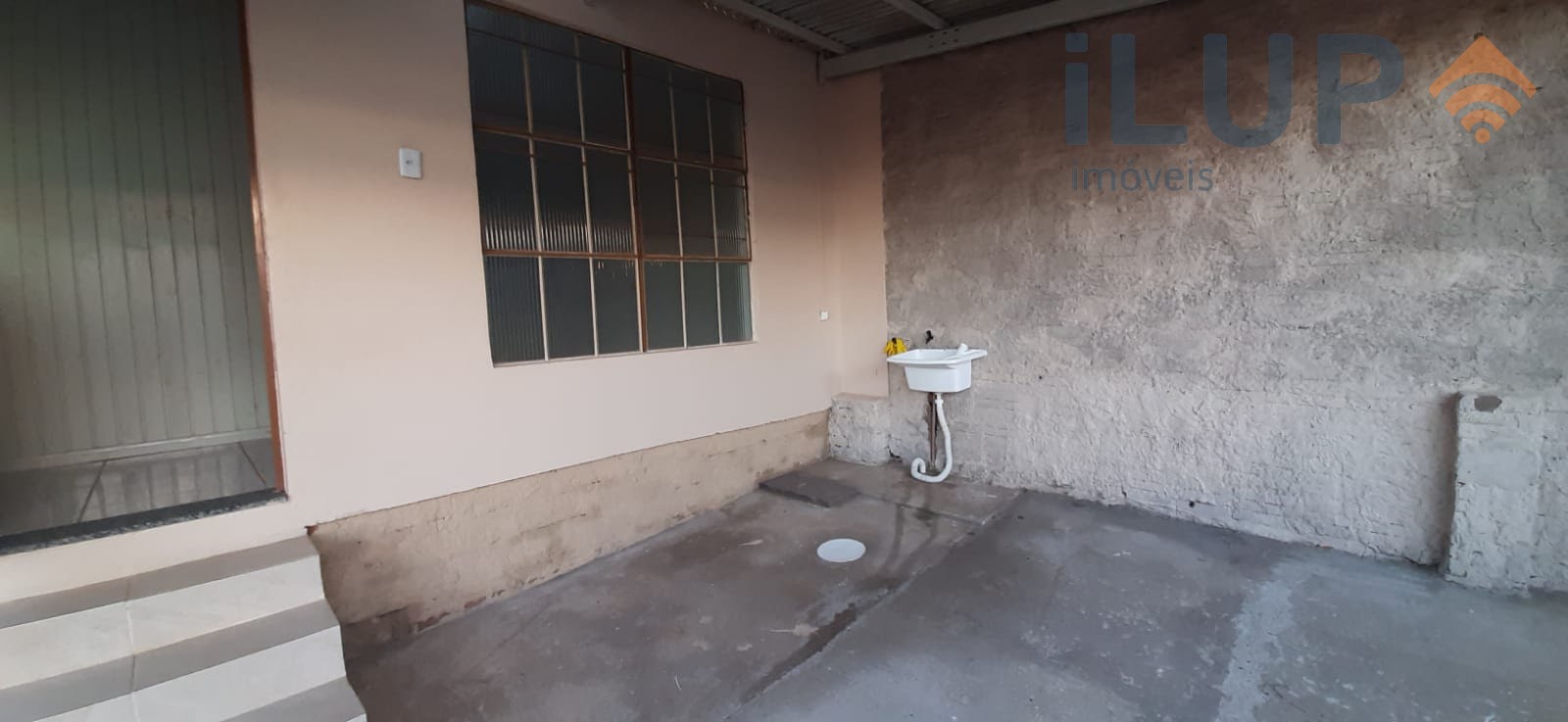 Área de serviço e garagem
