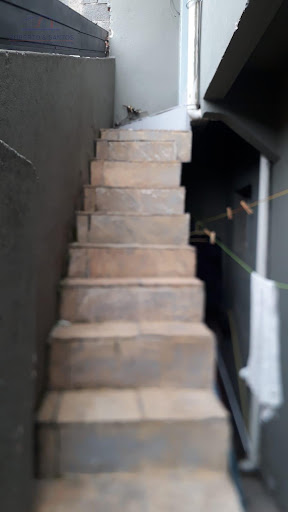 Escadas para o dormitório