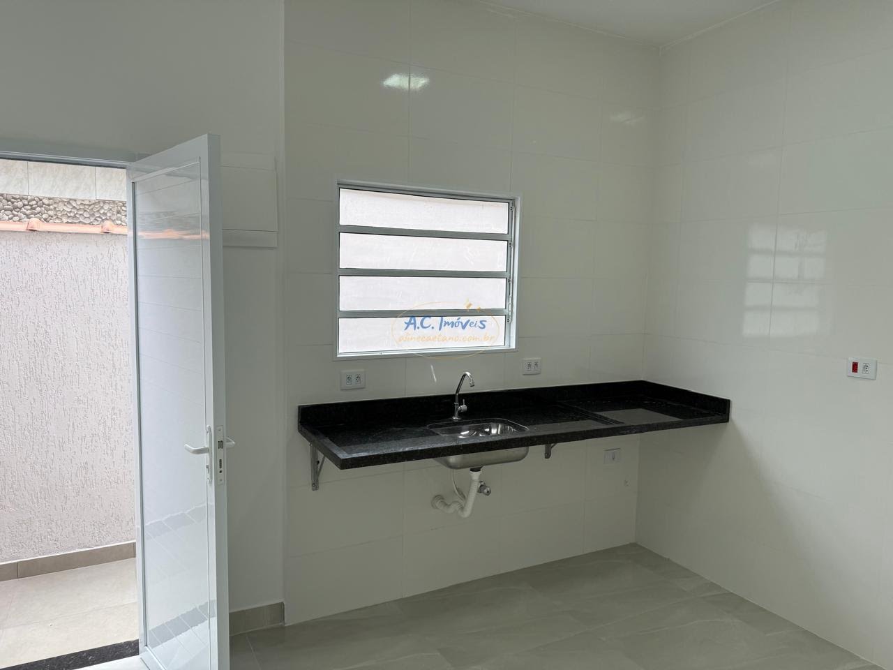 Casa à venda com 2 quartos, 1 suíte, 2 vagas e 70m² no Maracanã, Praia Grande (SP) — foto 13 de 19