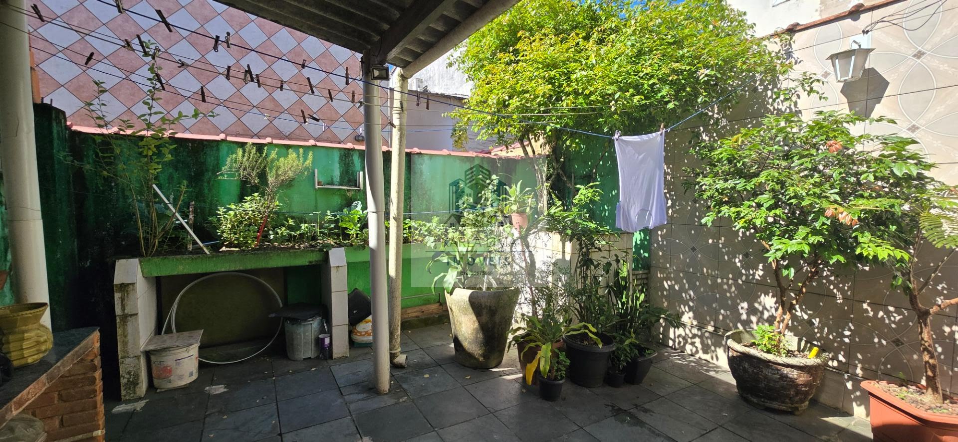 Casa à venda com 4 quartos, 2 banheiros, 1 vaga e 61m² no Jardim Progresso (vicente de Carvalho), Guarujá (SP) — foto 15 de 30
