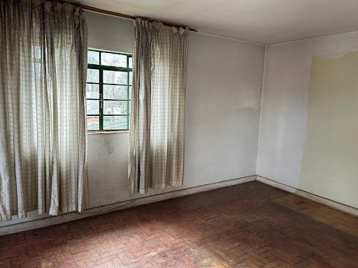 Sala com piso em taco