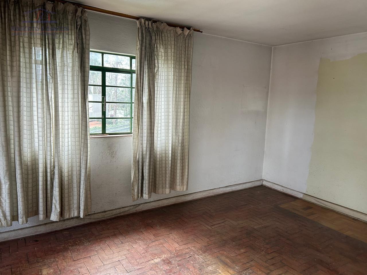 Sala com piso em taco