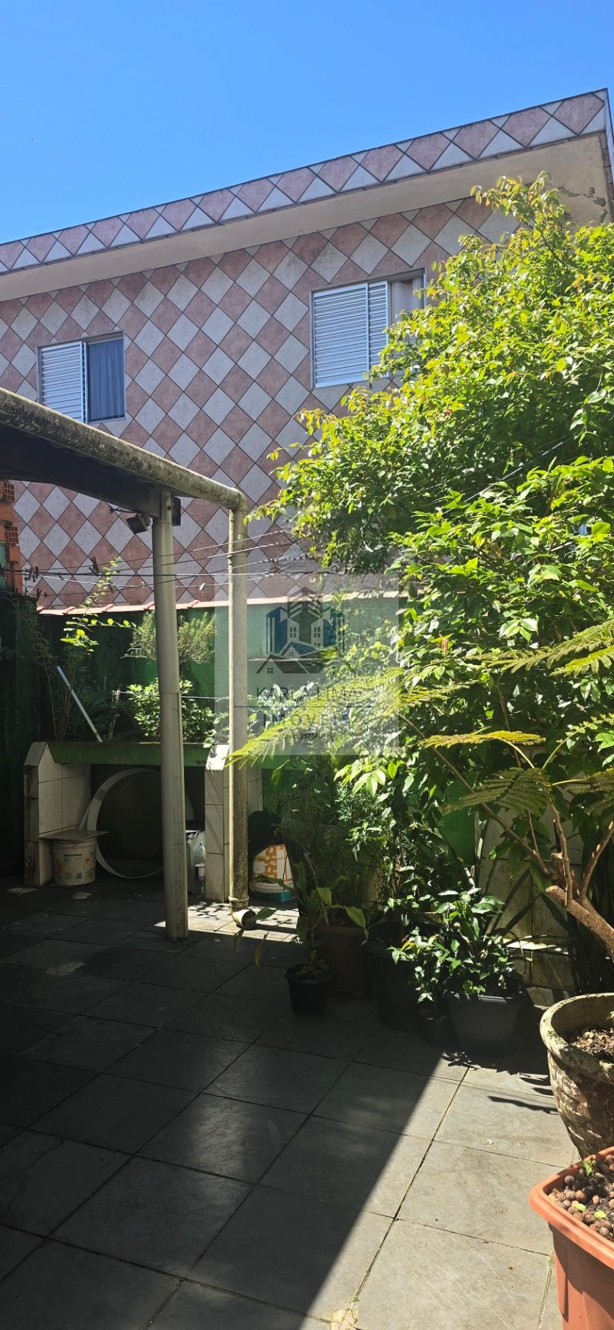 Casa à venda com 4 quartos, 2 banheiros, 1 vaga e 61m² no Jardim Progresso (vicente de Carvalho), Guarujá (SP) — foto 26 de 30
