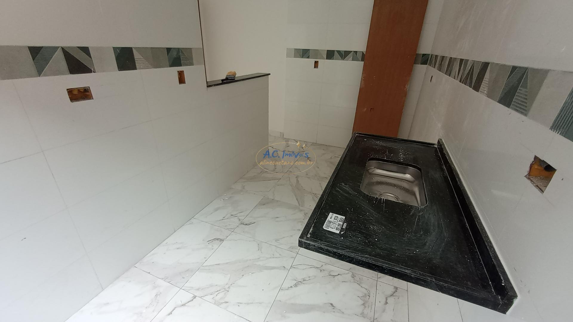 Casa à venda com 2 quartos, 2 banheiros, 1 vaga e 68m² no Sítio do Campo, Praia Grande (SP) — foto 14 de 27