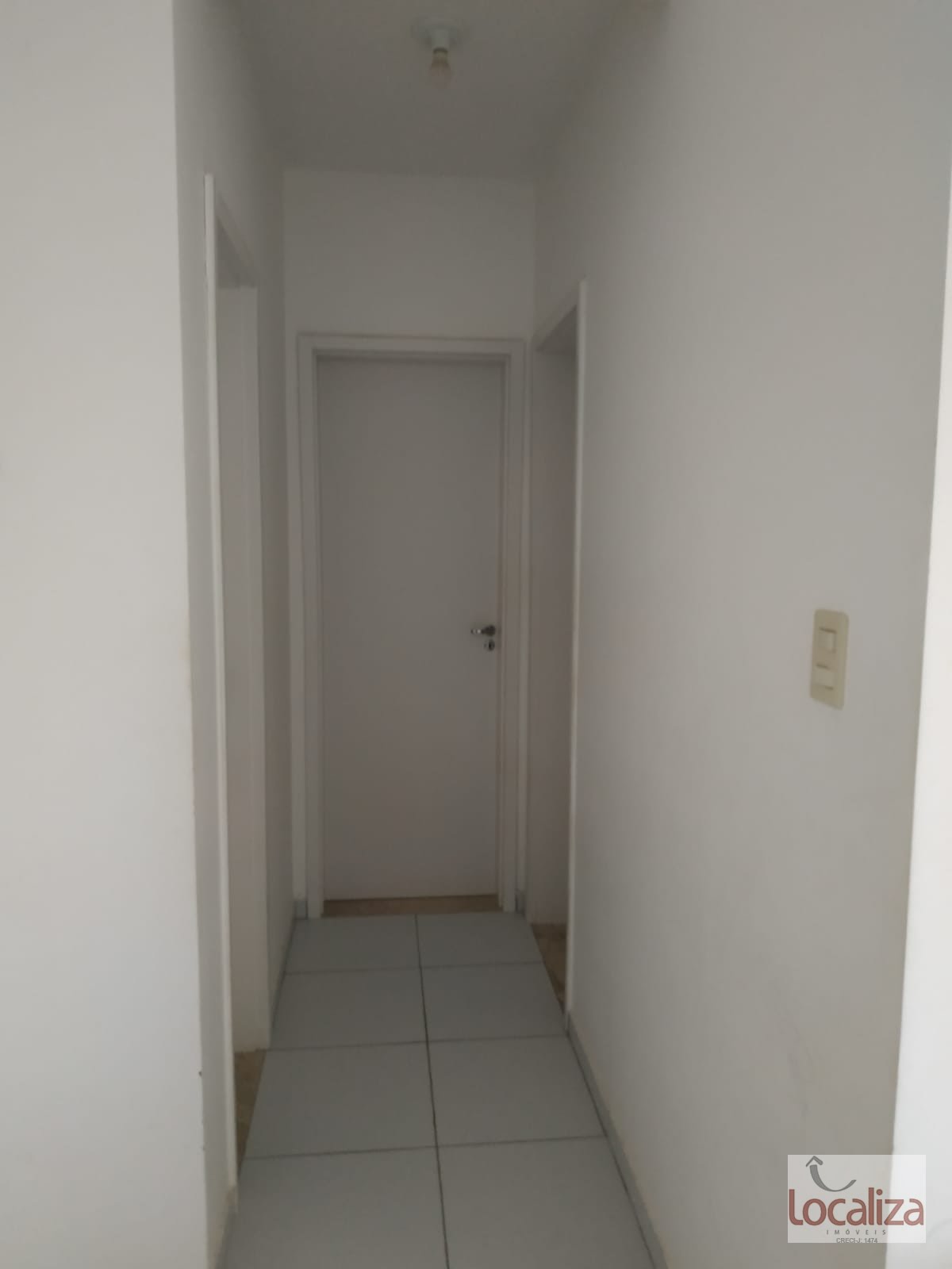 Corredor de acesso ao banheiro e aos quartos 