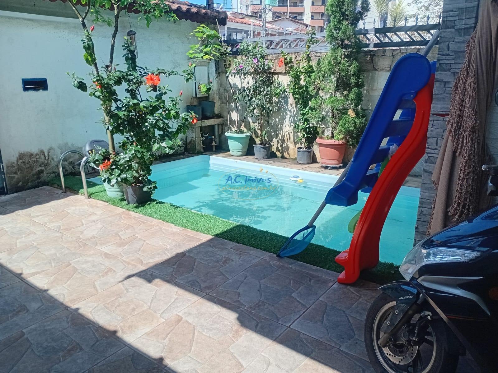 Casa à venda com 3 quartos, 1 suíte, 2 vagas e 107m² no Vila Tupi, Praia Grande (SP) — foto 13 de 24