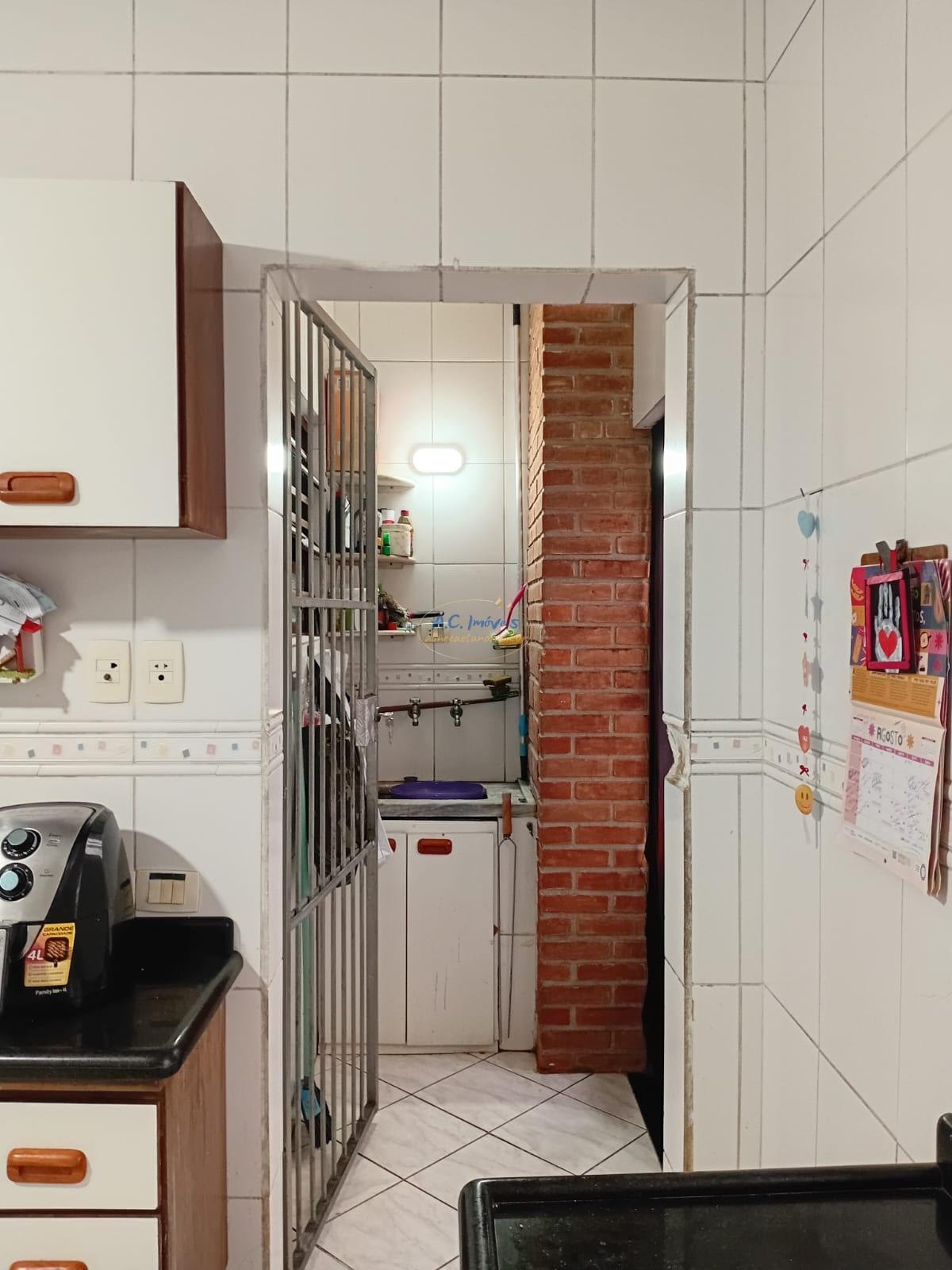 Casa à venda com 3 quartos, 1 suíte, 2 vagas e 107m² no Vila Tupi, Praia Grande (SP) — foto 9 de 24