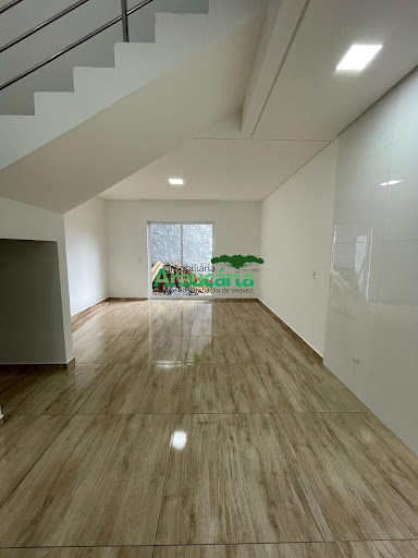 Sala e cozinha em conceito aberto