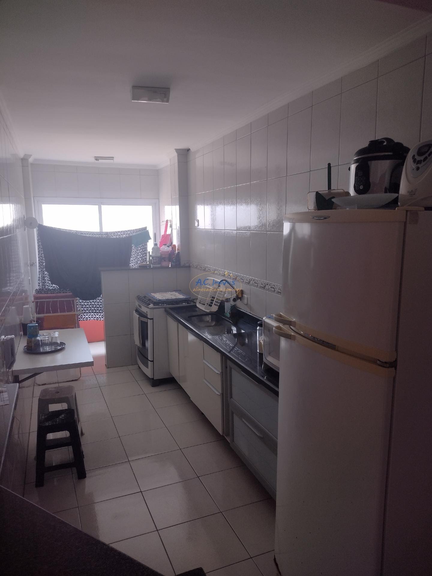 Apartamento à venda com 1 quarto, 1 banheiro, 1 vaga e 59m² no Vila Tupi, Praia Grande (SP) — foto 28 de 30