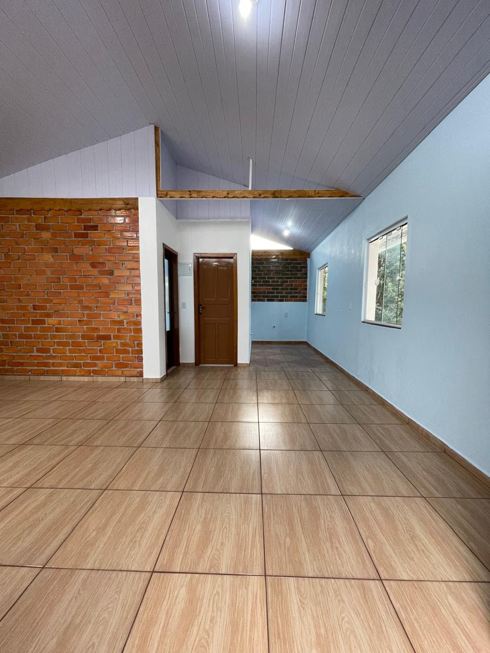Sala e cozinha em conceito aberto