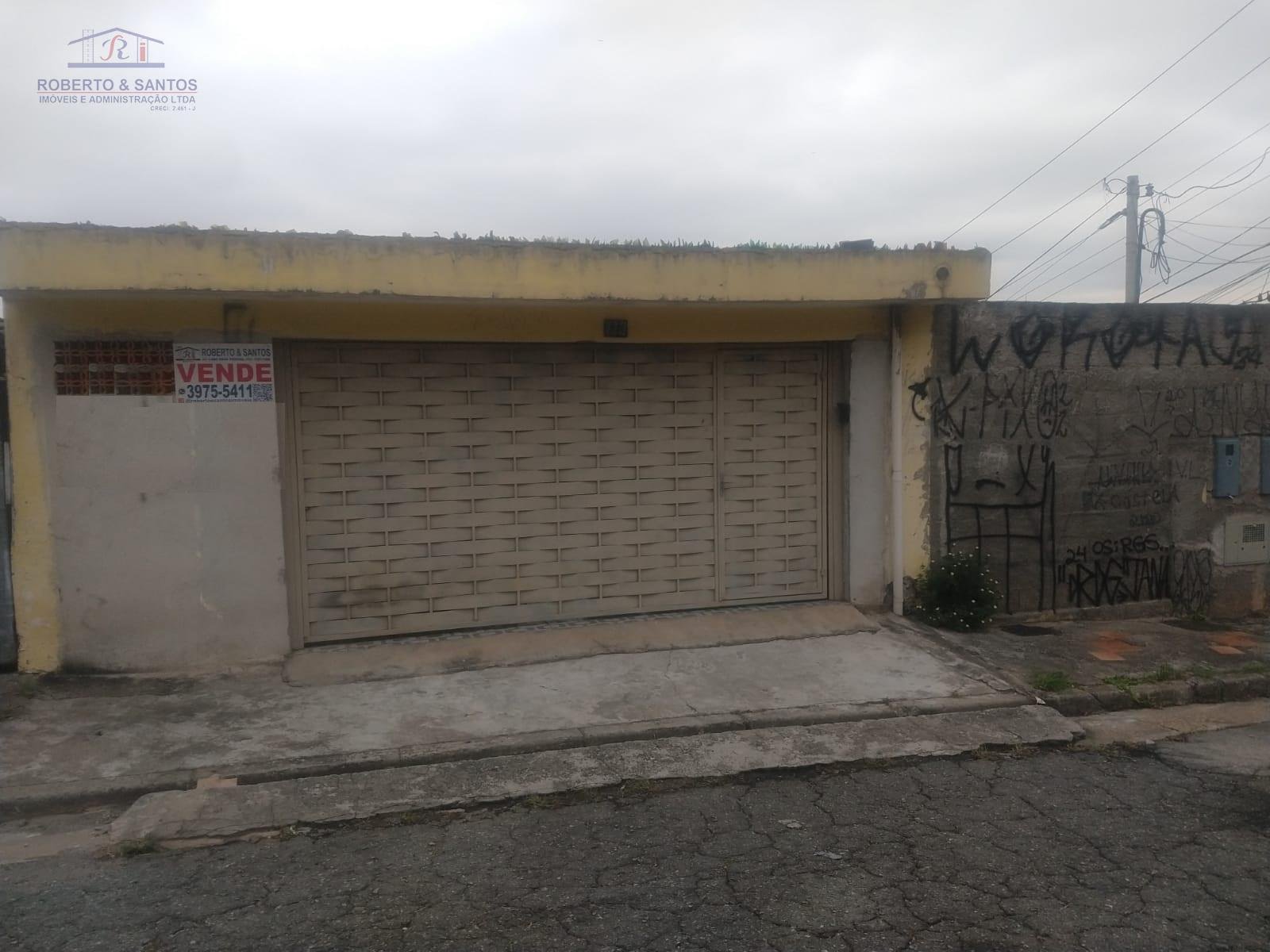 Frente da garagem, casa da frente
