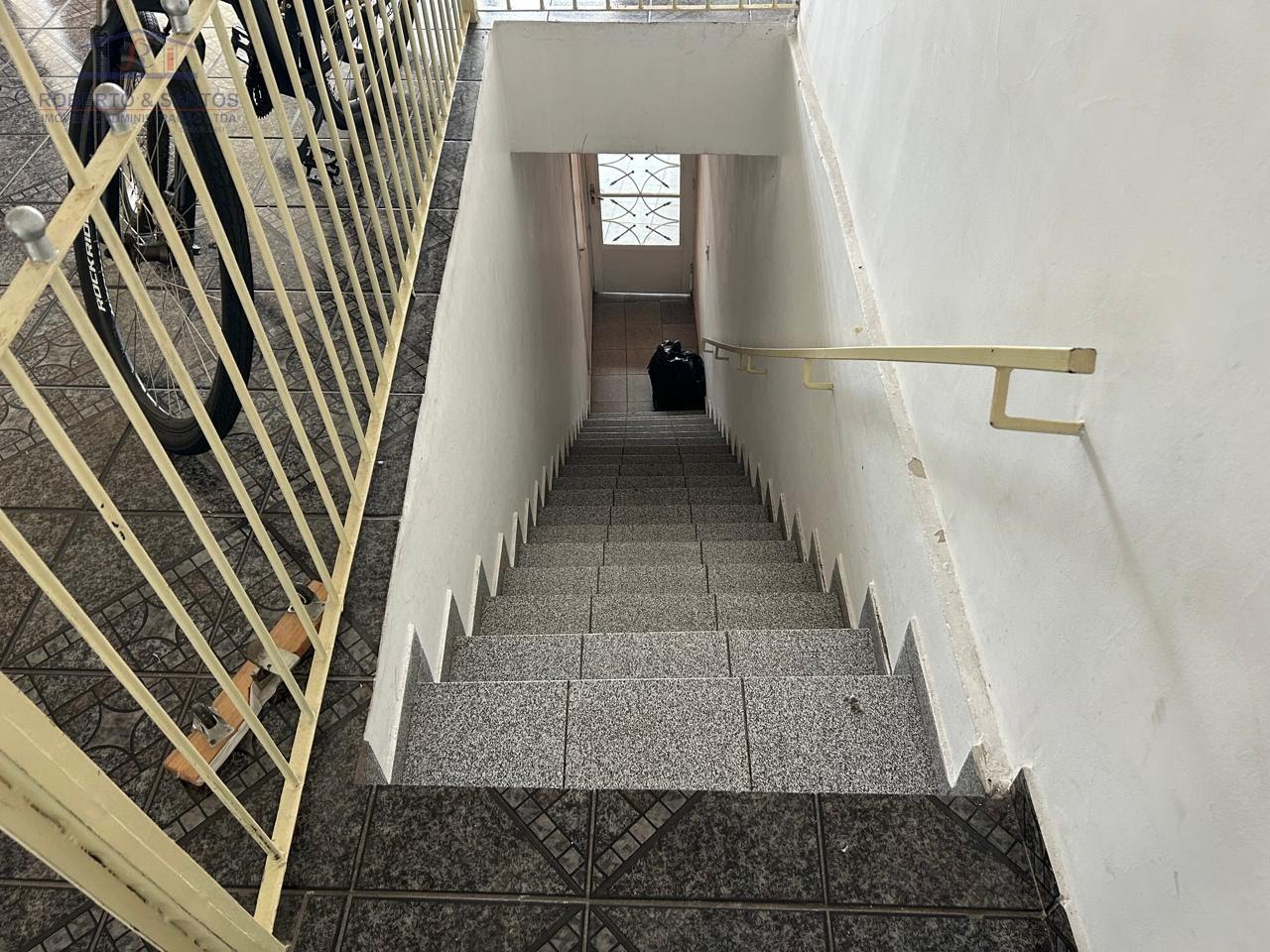 Escadas de acesso para a casa
