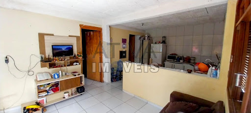 Sala estar social e cozinha