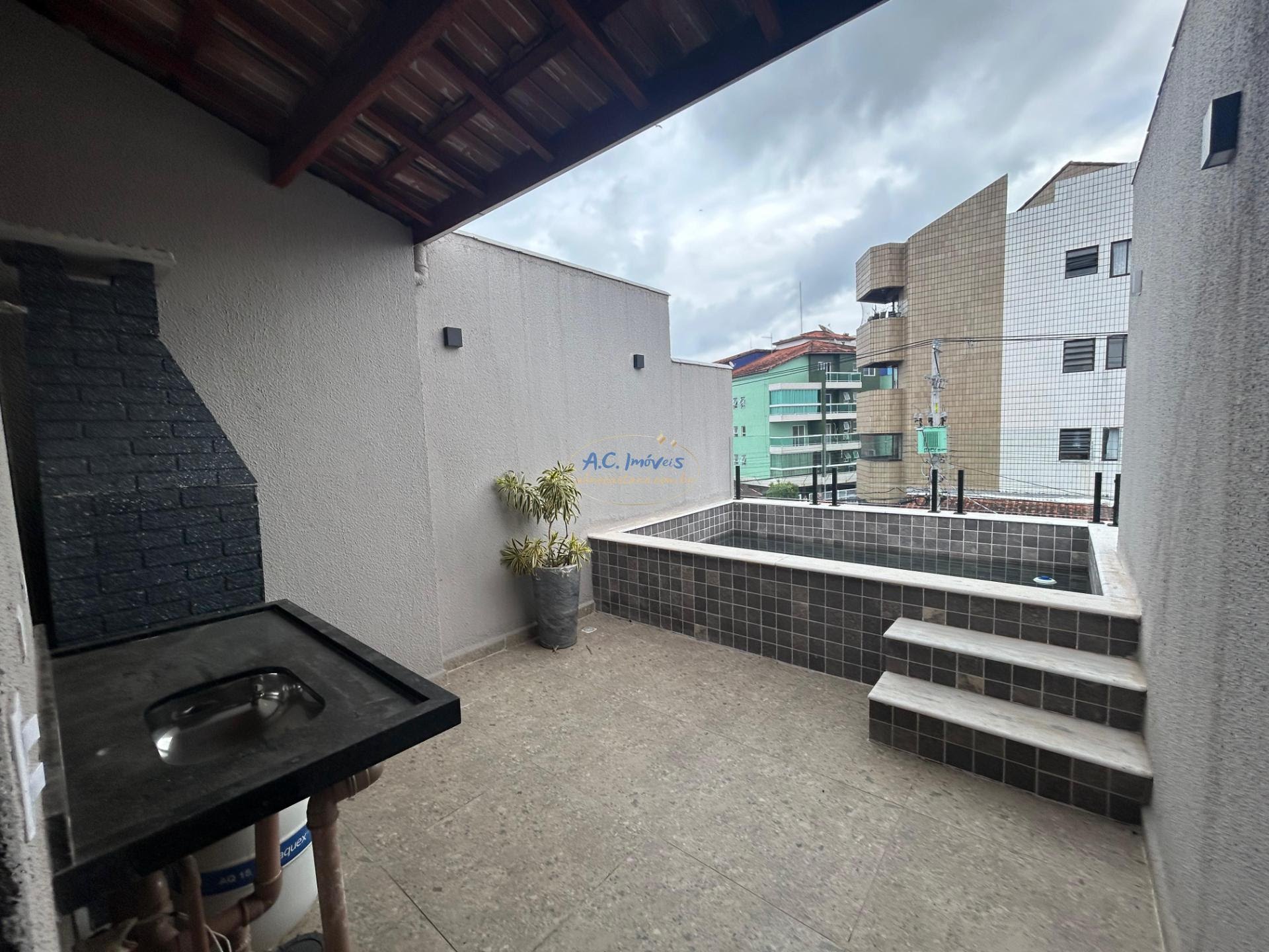 Casa à venda com 3 quartos, 1 suíte, 1 vaga e 108m² no Vila Caiçara, Praia Grande (SP) — foto 17 de 21