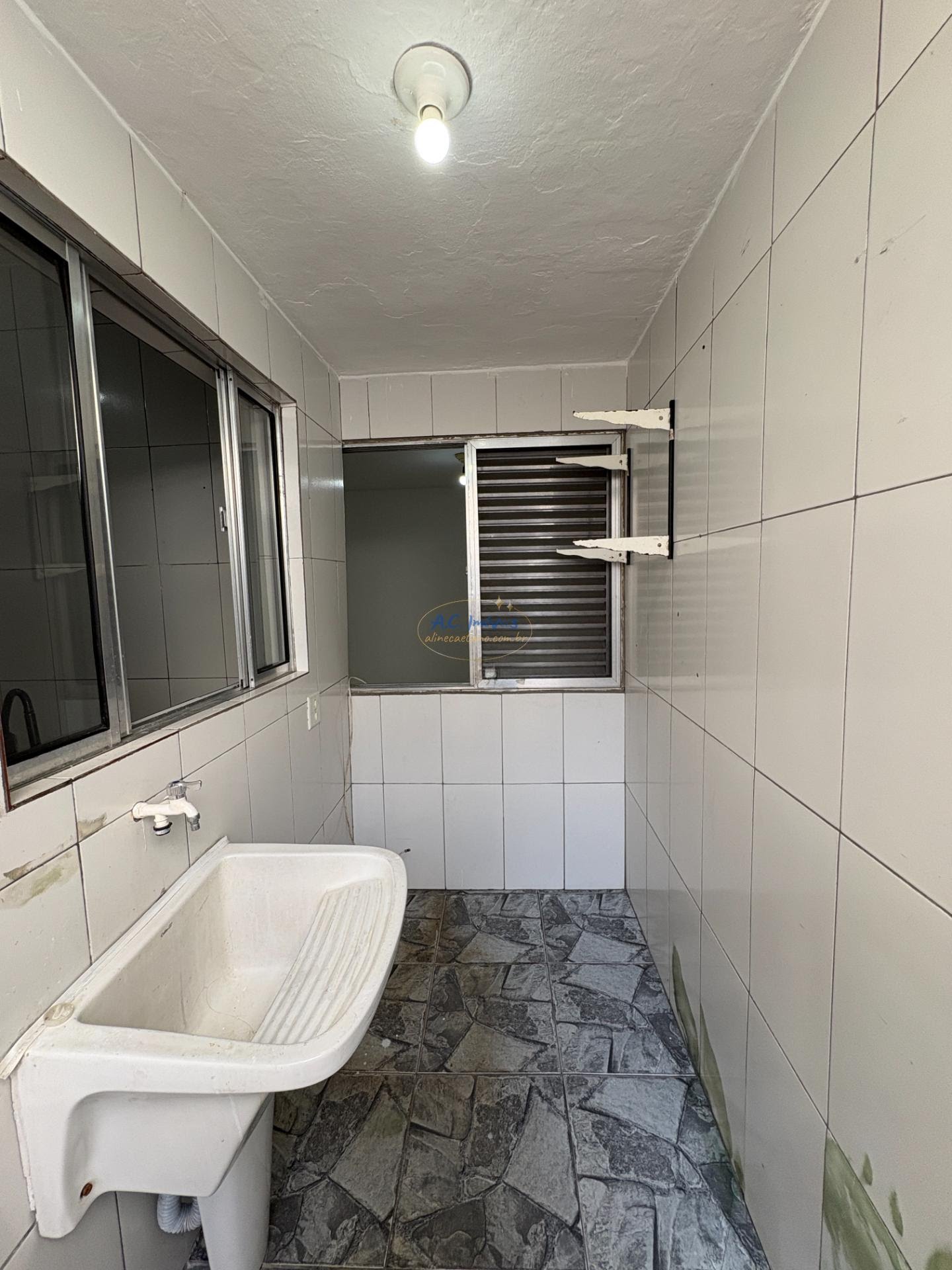 Casa à venda com 1 quarto, 1 banheiro, 2 vagas e 62m² no Guilhermina, Praia Grande (SP) — foto 19 de 26