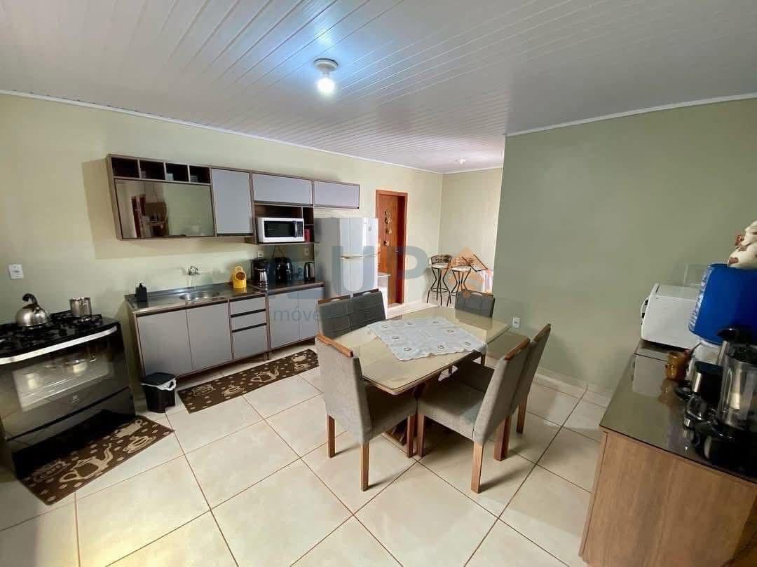 Sala de jantar e cozinha integradas