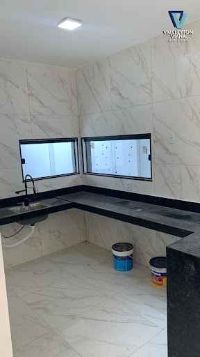 Cozinha com bancada em mármore 