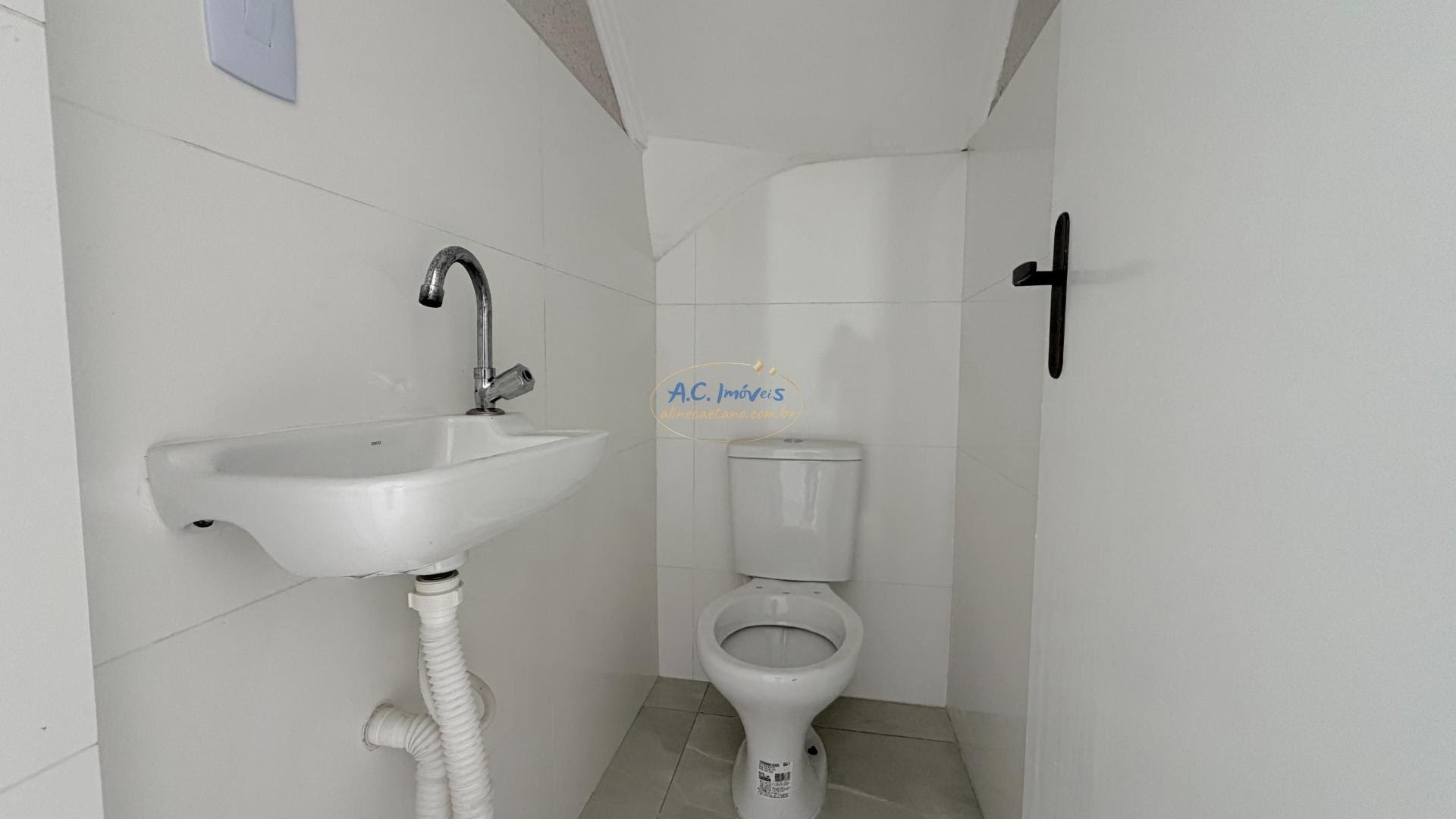 Casa à venda com 2 quartos, 2 banheiros, 1 vaga e 61m² no Quietude, Praia Grande (SP) — foto 3 de 12