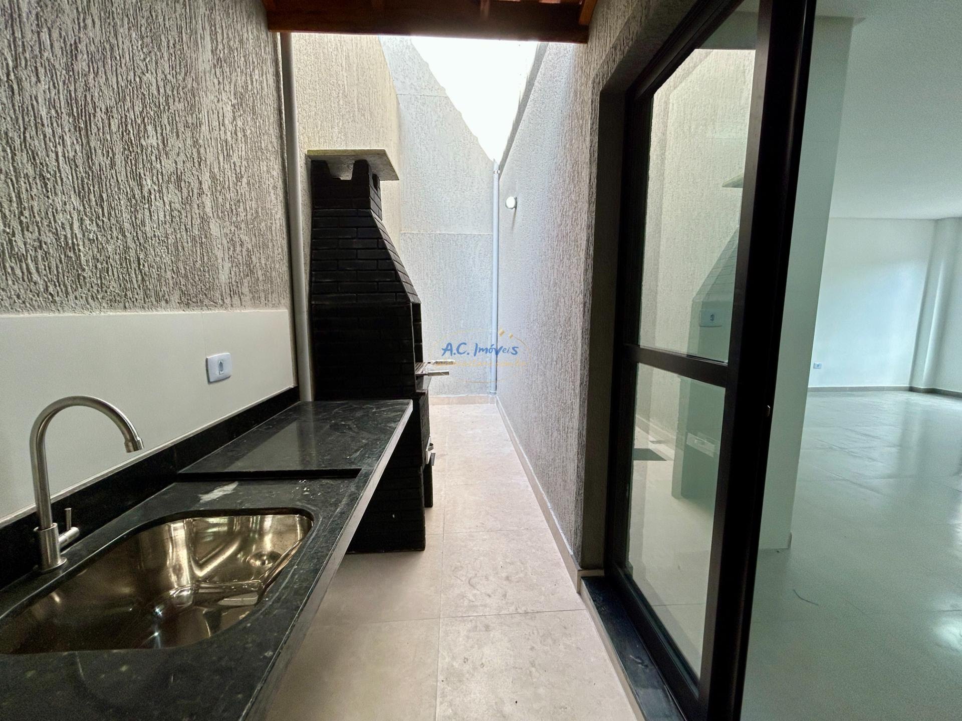 Casa à venda com 2 quartos, 2 suítes, 1 vaga e 60m² no Jardim Melvi, Praia Grande (SP) — foto 12 de 30