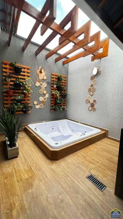 Casa à venda com 3 quartos, 3 banheiros, 2 vagas e 115m² no Vilamar, Praia Grande — foto principal