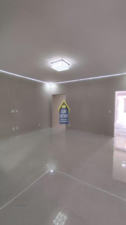 Casa à venda com 3 quartos, 2 banheiros, 2 vagas e 110m² no Tupi, Praia Grande — foto principal
