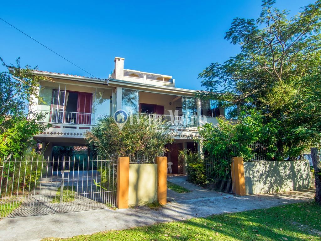 Casa para alugar com 4 quartos, 3 banheiros, 4 vagas e 200m² no Daniela, Florianópolis — foto principal