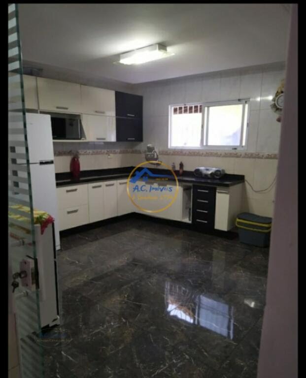 Casa à venda com 3 quartos, 1 suíte, 2 vagas e 90m² no Vila Tupi, Praia Grande (SP) — foto 20 de 21