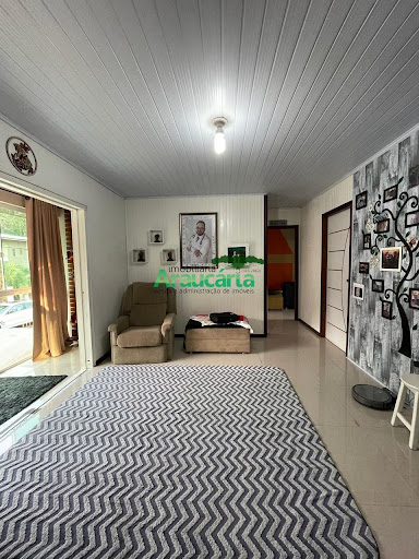 Sala de TV com sacada