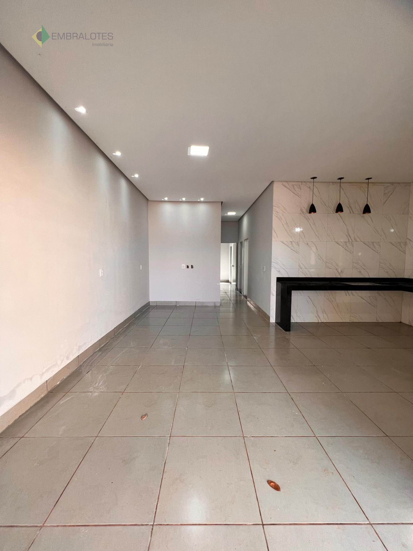 Sala e cozinha em conceito aberto