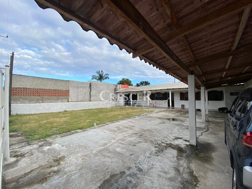 Casa com terreno amplo à venda e financiável em Matinhos