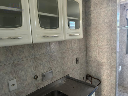 Cozinha com armário de aço