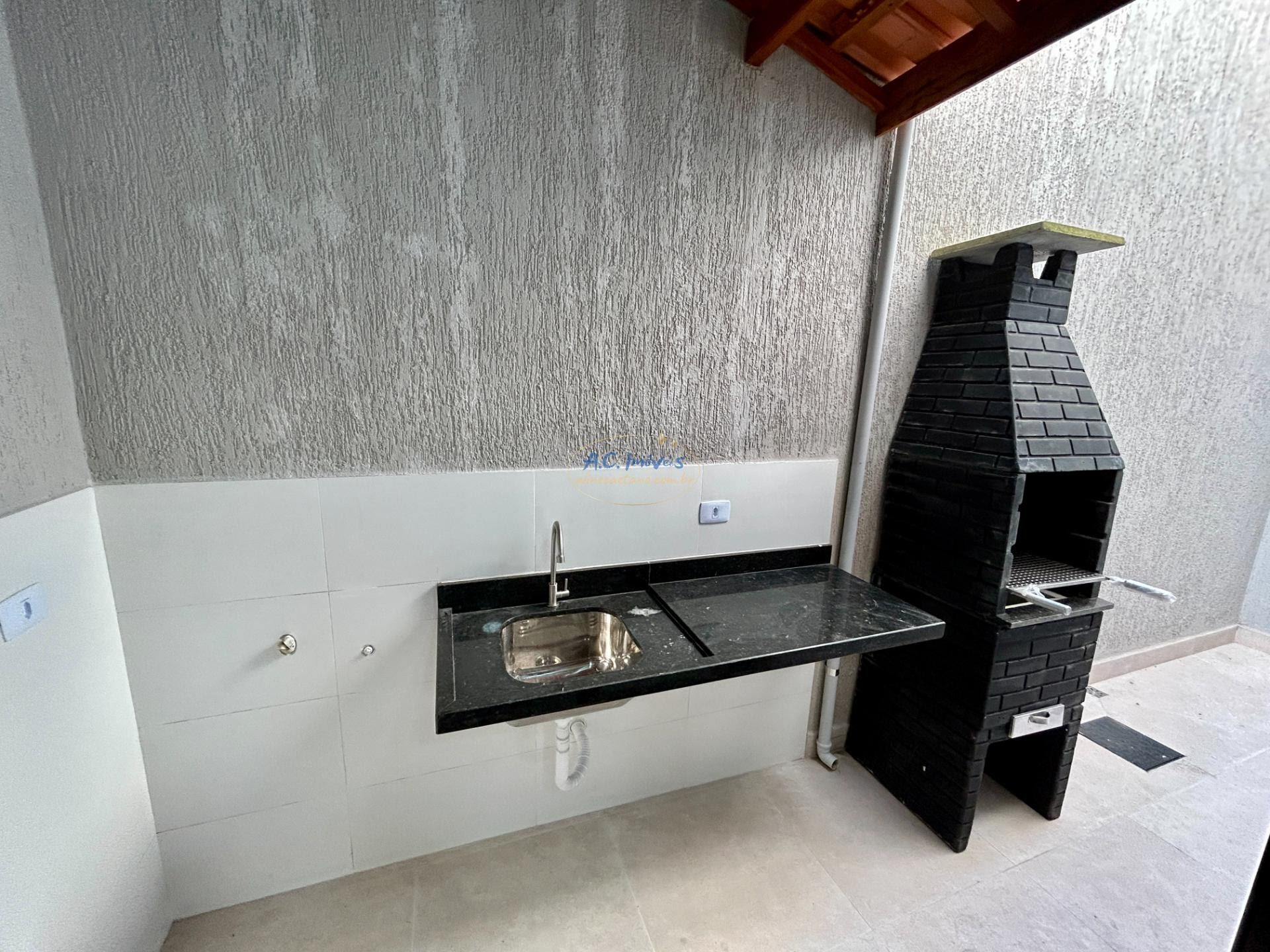 Casa à venda com 2 quartos, 2 suítes, 1 vaga e 60m² no Jardim Melvi, Praia Grande (SP) — foto 15 de 30