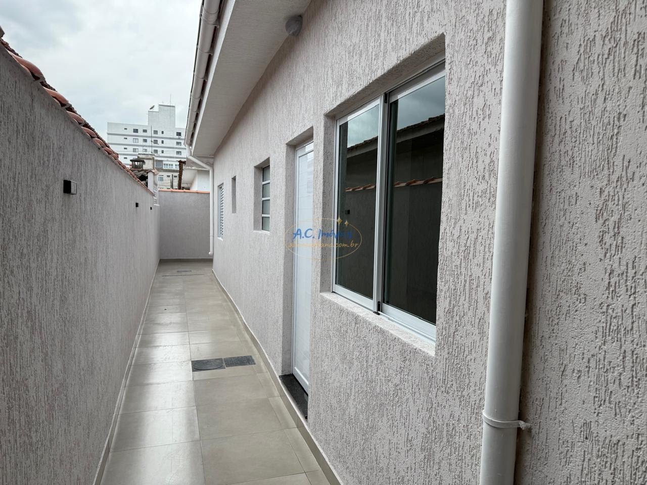 Casa à venda com 2 quartos, 1 suíte, 1 vaga e 70m² no Maracanã, Praia Grande (SP) — foto 10 de 19
