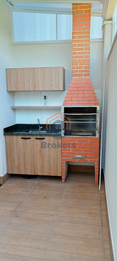 Área gourmet com churrasqueira 
