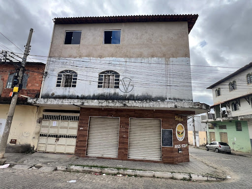 Vendo prédio com 04 moradias e um ponto comercial