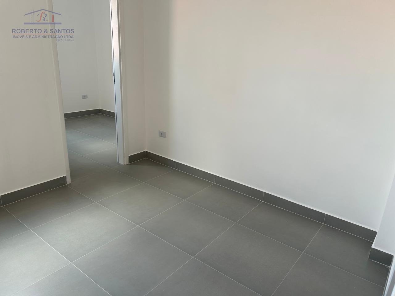 Sala conjugada com a cozinha