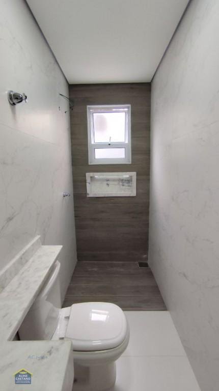 Casa à venda com 3 quartos, 2 suítes, 2 vagas e 110m² no Vila Tupi, Praia Grande (SP) — foto 7 de 30