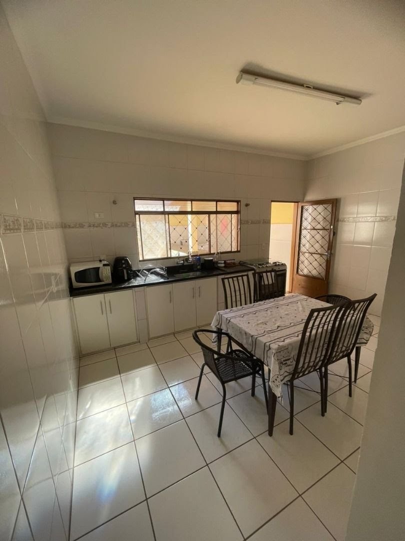 Casa à venda com 3 quartos, 3 banheiros, 2 vagas e 121m² no Jardim Anhangüera, Ribeirão Preto — foto principal
