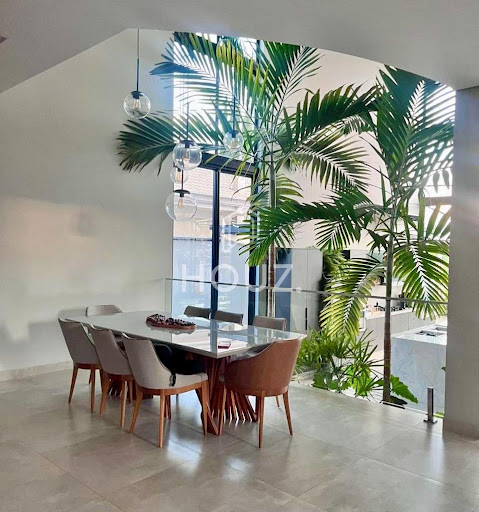 Sala de jantar e jardim de inverno