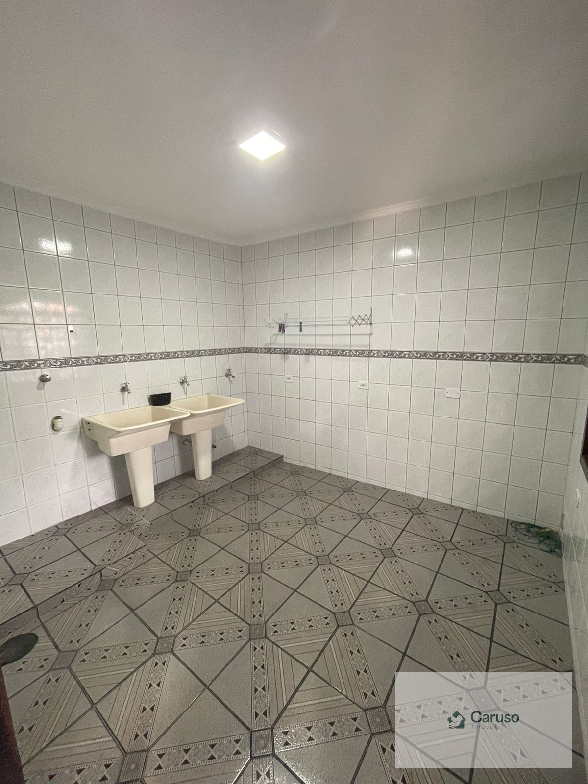 Casa à venda com 3 quartos, 1 suíte, 5 vagas e 259m² no Condomínio Country Club, Arujá (SP) — foto 19 de 23