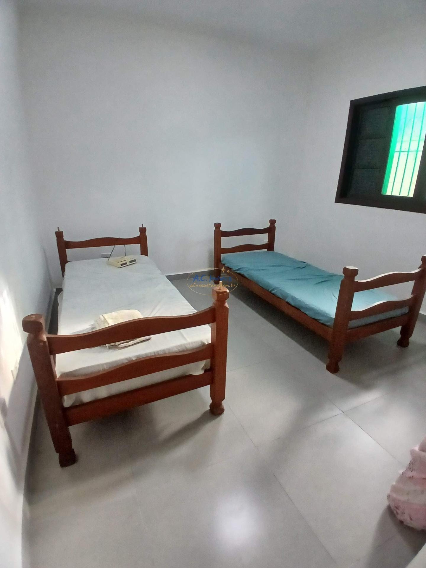 Casa à venda com 2 quartos, 1 suíte, 2 vagas e 125m² no Ocian, Praia Grande (SP) — foto 16 de 28
