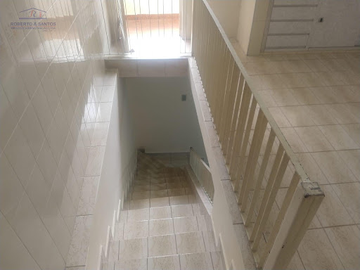 Escadas para o dormitório de baixo