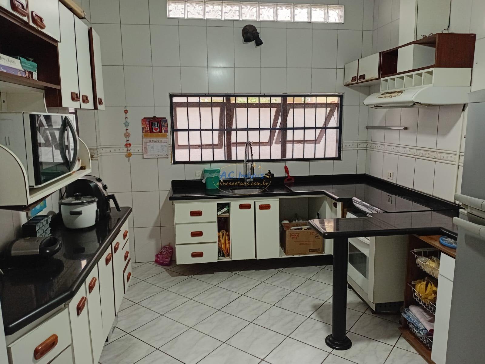 Casa à venda com 3 quartos, 1 suíte, 2 vagas e 107m² no Vila Tupi, Praia Grande (SP) — foto 18 de 24
