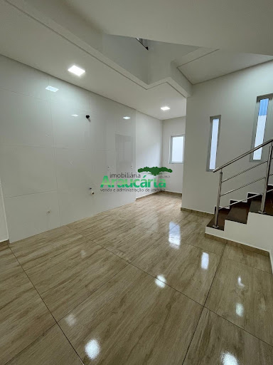 Sala e cozinha em conceito aberto