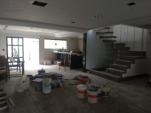 Sala e cozinha com espaço aberto