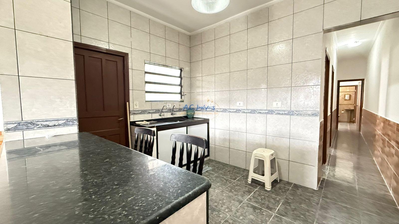 Casa à venda com 2 quartos, 1 suíte, 2 vagas e 70m² no Cidade Ocian, Praia Grande (SP) — foto 25 de 28