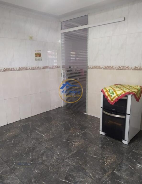 Casa à venda com 3 quartos, 1 suíte, 2 vagas e 90m² no Vila Tupi, Praia Grande (SP) — foto 17 de 21