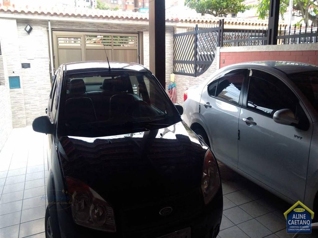 Casa à venda com 3 quartos, 3 banheiros, 4 vagas e 131m² no Vila Tupi, Praia Grande — foto principal